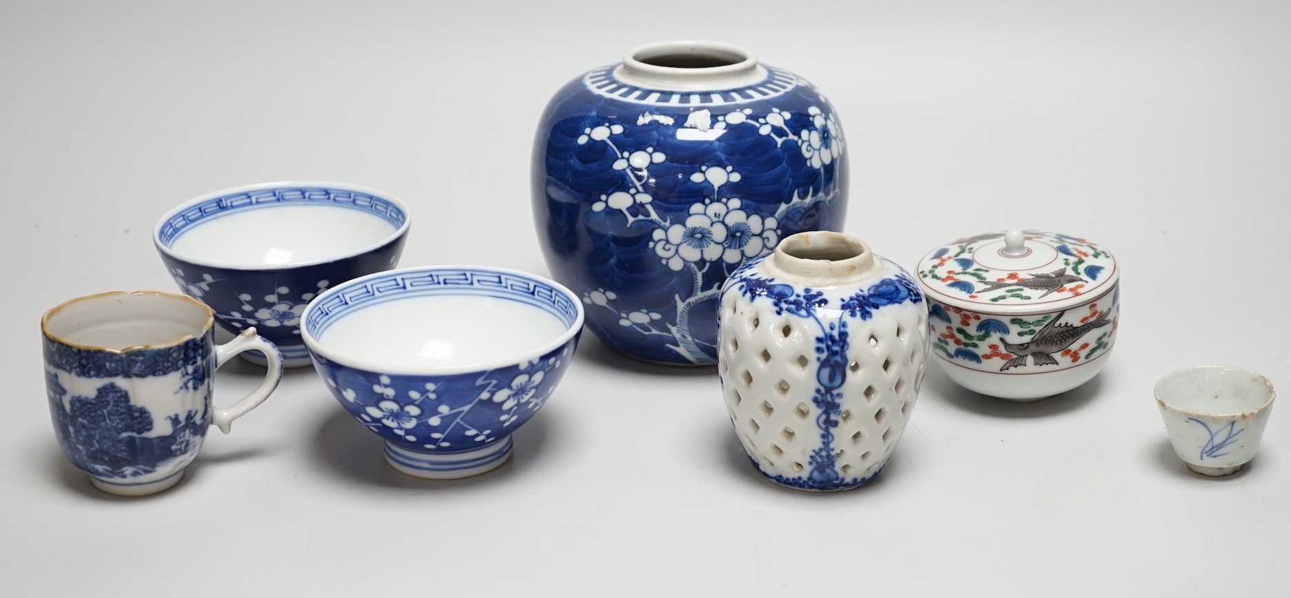 A group of mixed Chinese and Japanese porcelain vessels, tallest 11 cm